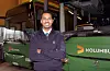 ALL GRUNN TIL Å SMILE: Mohammed Nadeem har fått sin eigen Tide-uniform. Tre og eit halvt år etter at han kom til Sauda er han nå bussjåfør. (Foto: Frank Waal)
