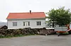 Fleirtalet i Utval for samfunnsutvikling meiner huseigaren kan få søka om dispensasjon for å behalda taket med raud teglstein.